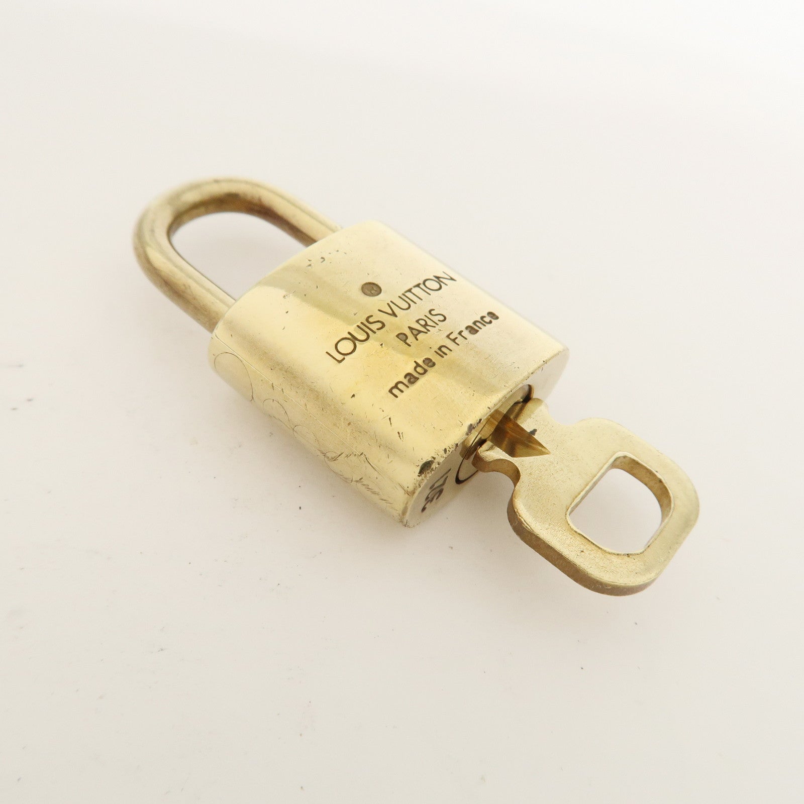 Louis Vuitton Set of 10 Lock 
Key Cadena Key Lock Metal Gold