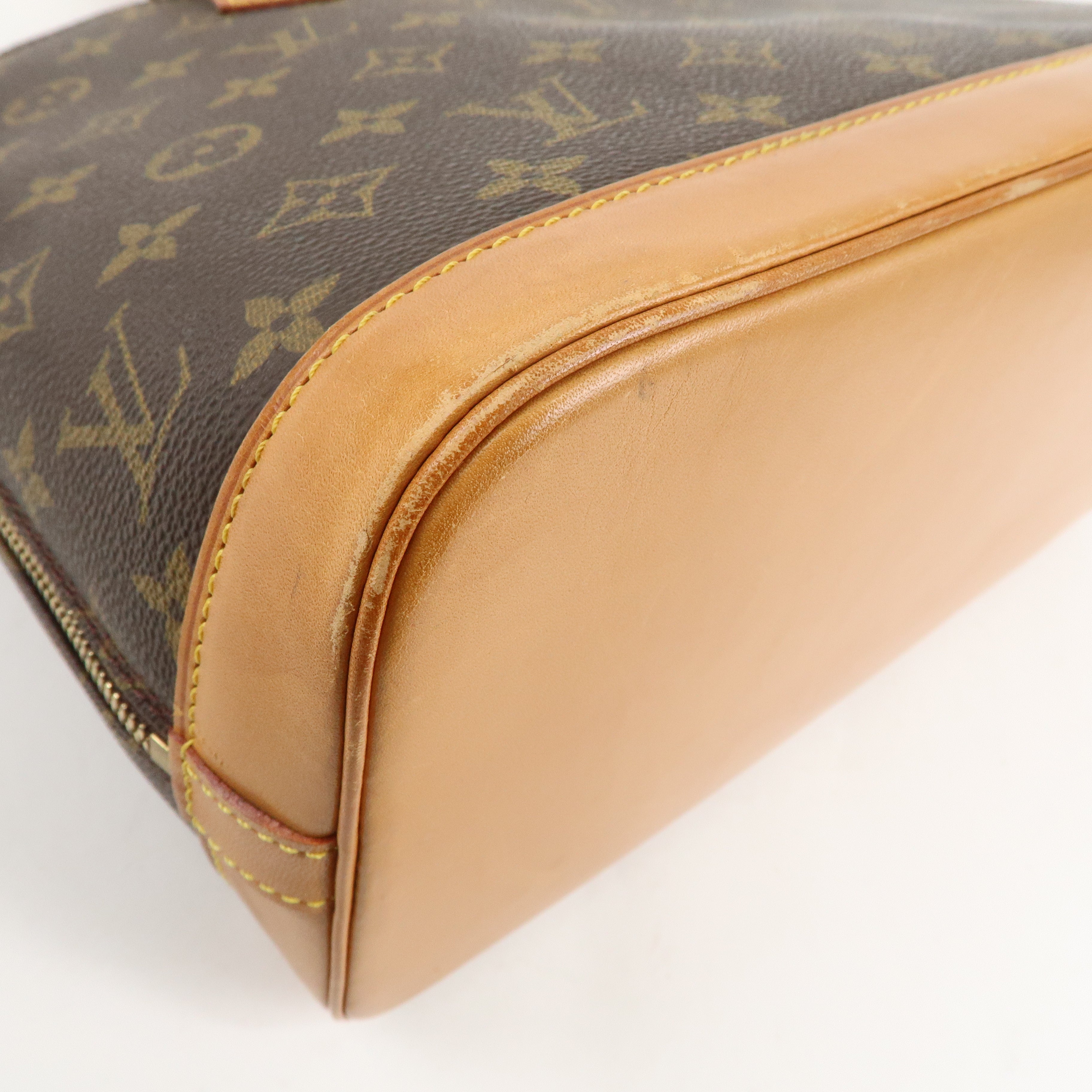 Louis Vuitton Monogram Alma Hand Bag Brown M51130