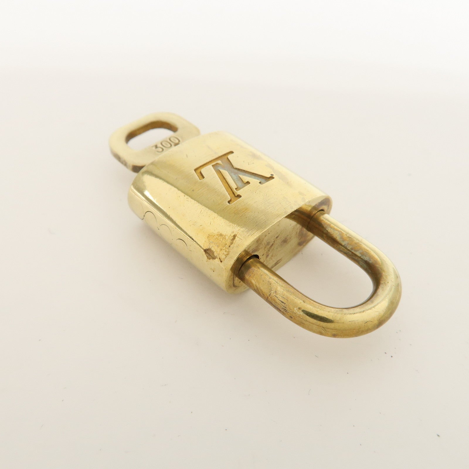 Louis Vuitton Set of 10 Lock 
Key Cadena Key Lock Metal Gold