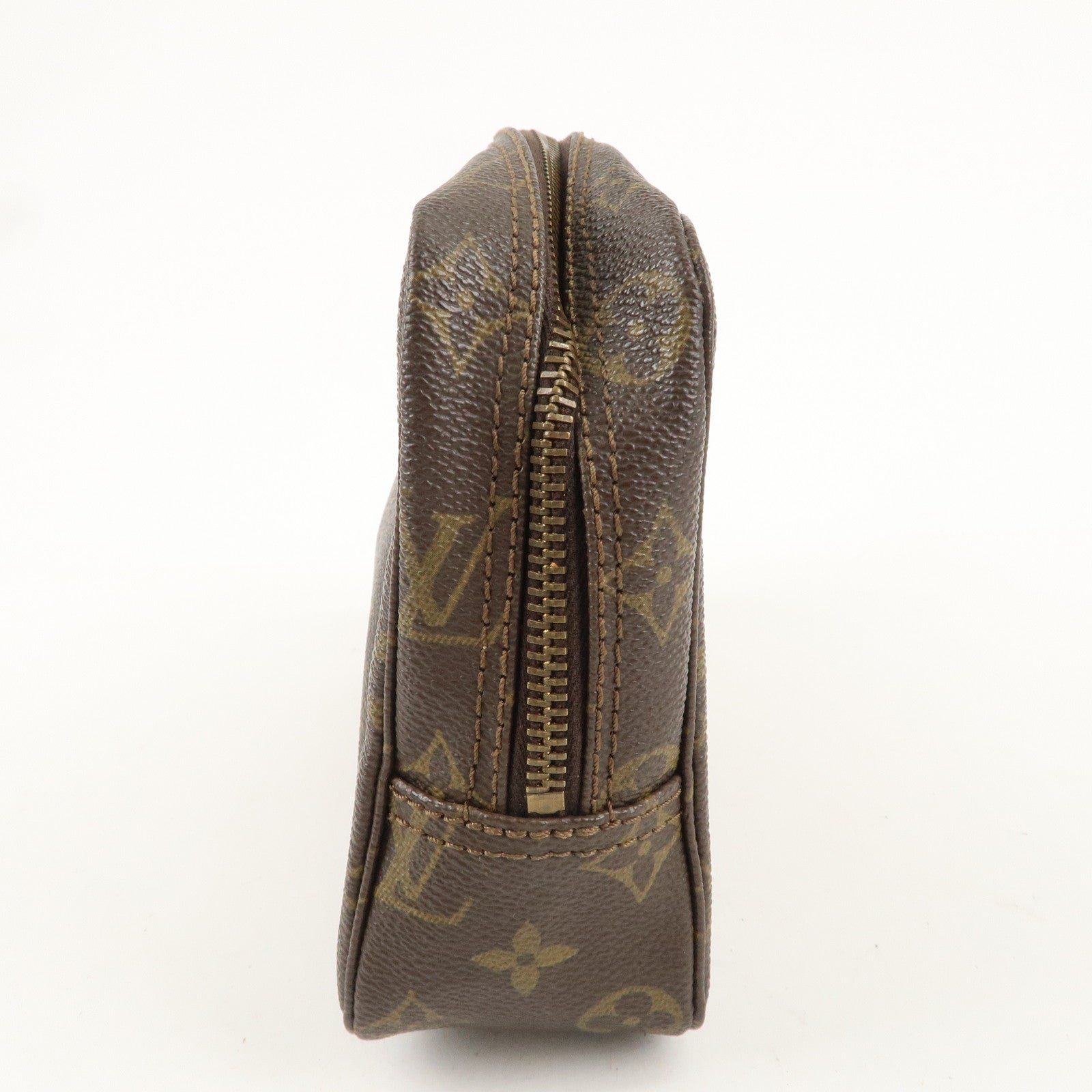 is Vuitton Monogram Trousse Toilette 23 Cosmetic Pouch M47524