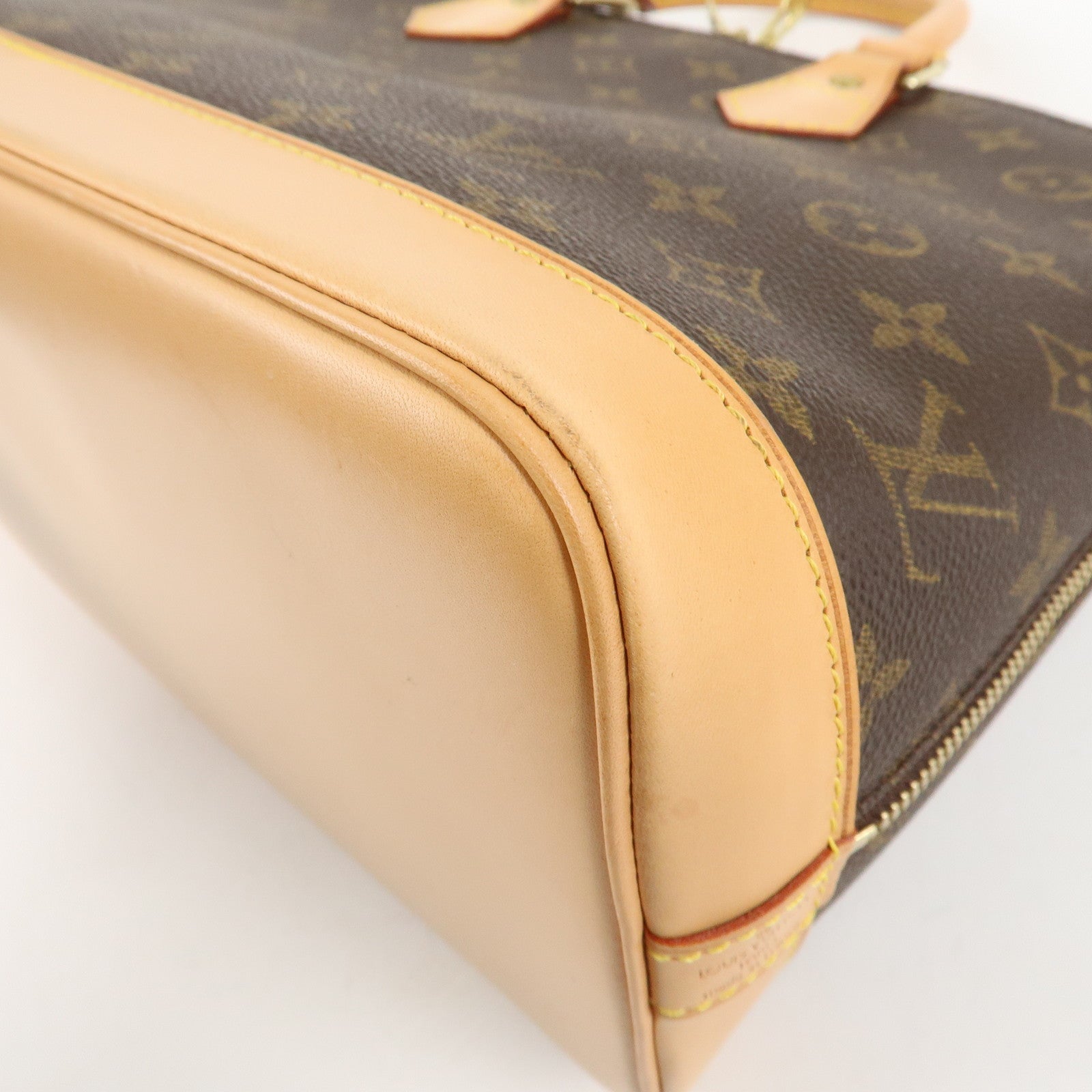 Louis Vuitton Monogram Alma Hand Bag Brown Gold Hardware M51130