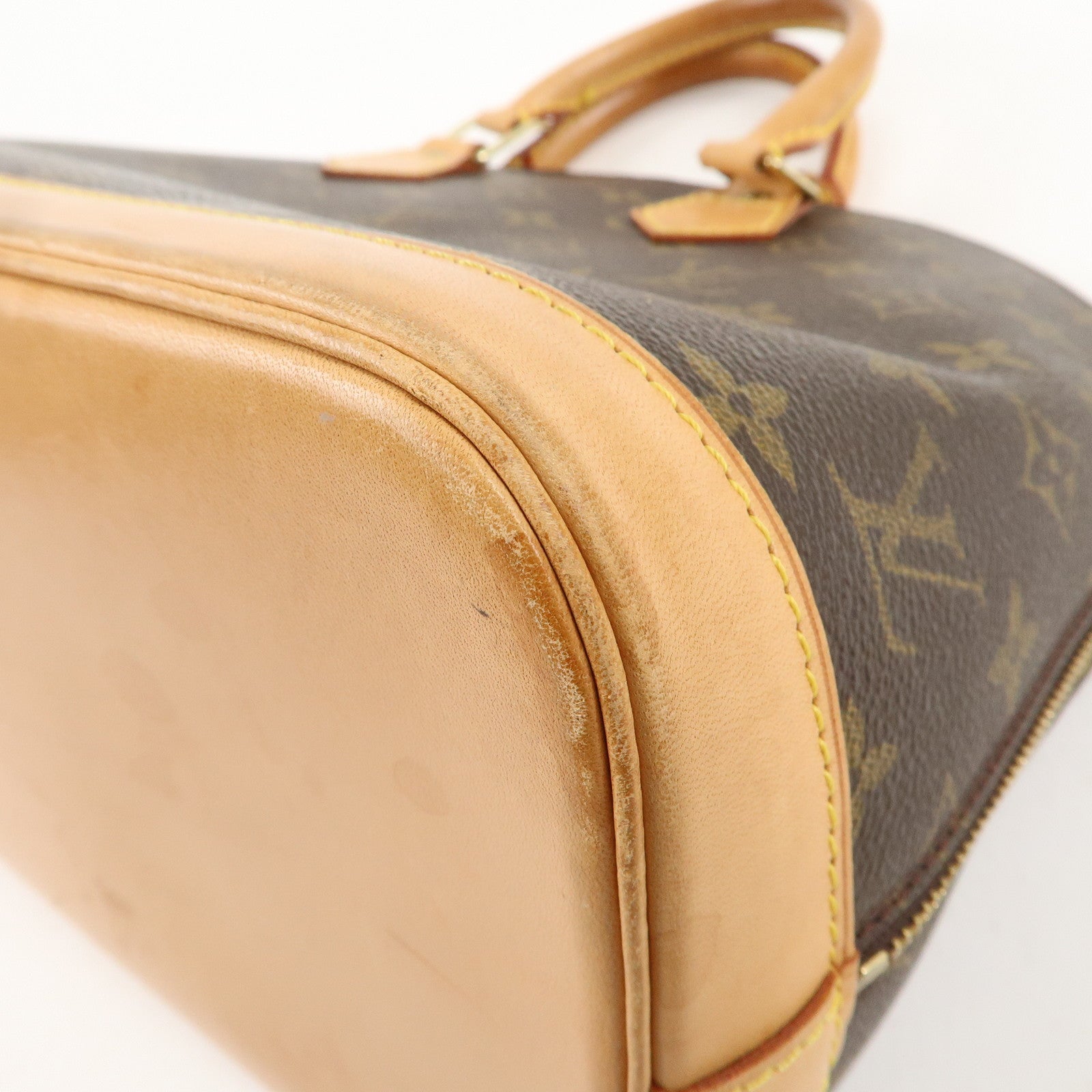 Louis Vuitton Monogram Alma Hand Bag Brown M51130