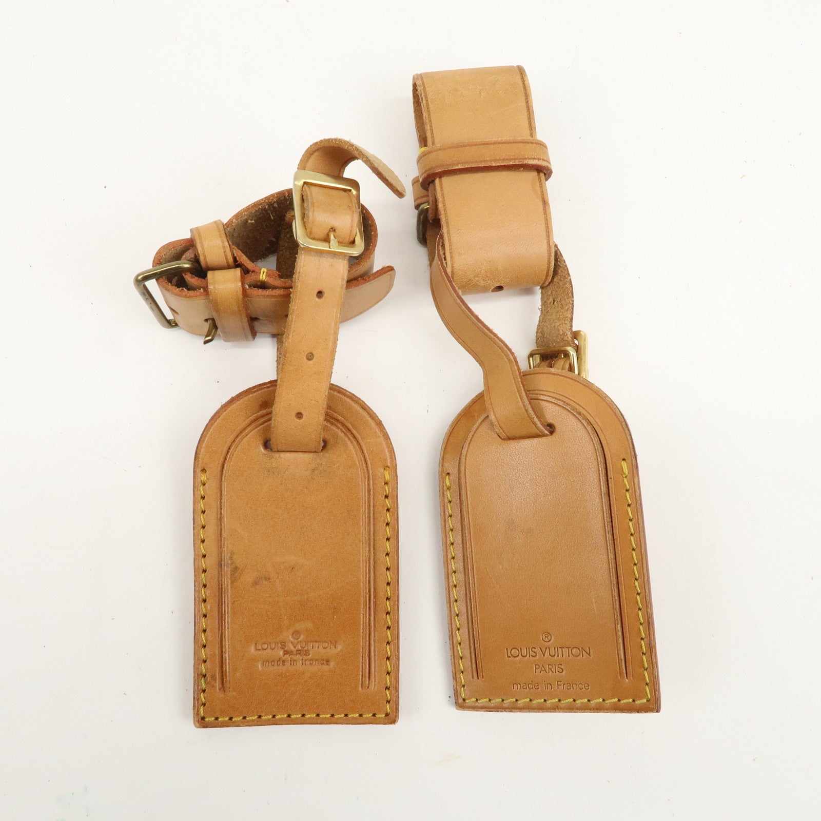 Louis Vuitton Set of 20 Leather Name Tag 
Poignet Natural