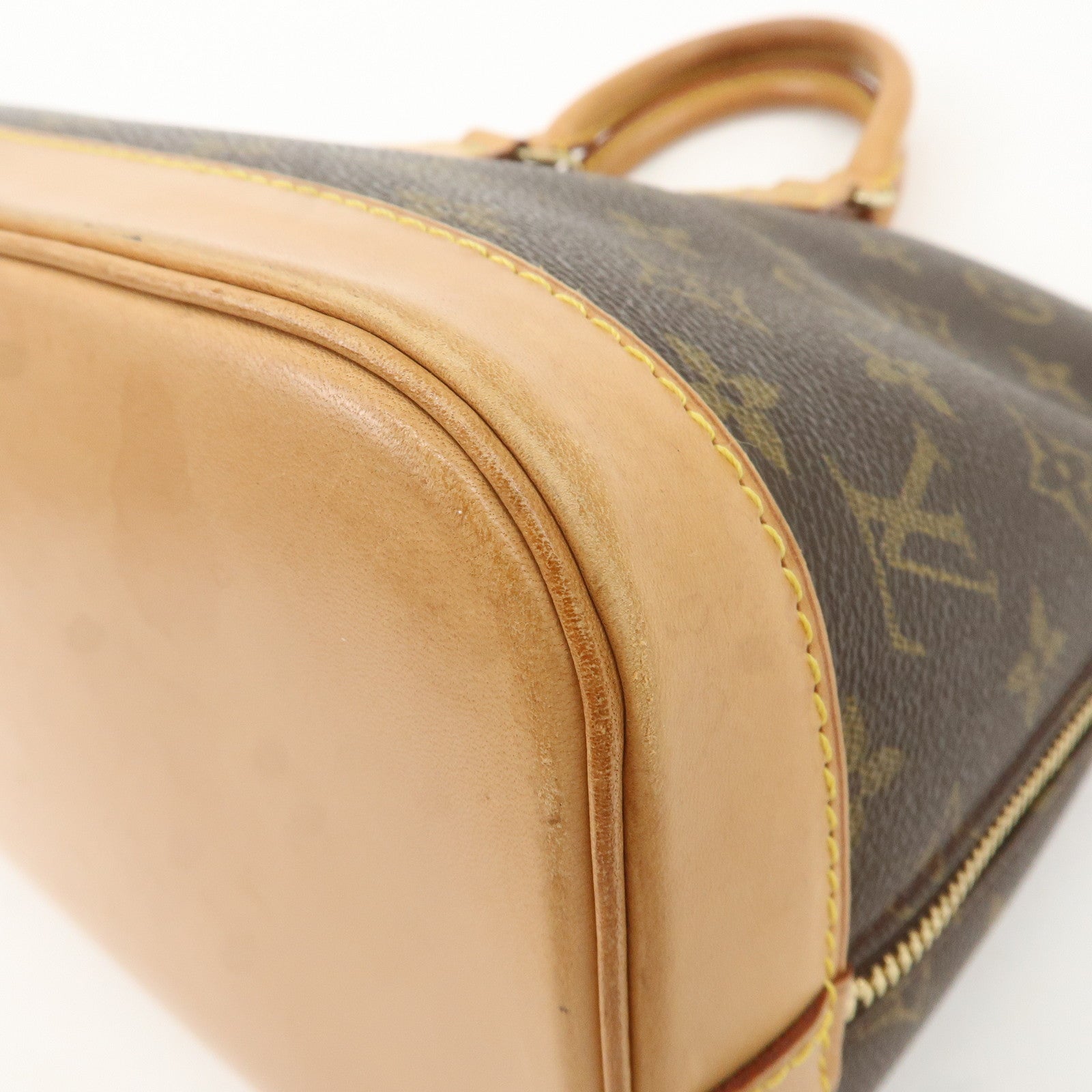 Louis Vuitton Monogram Alma Hand Bag Brown M51130