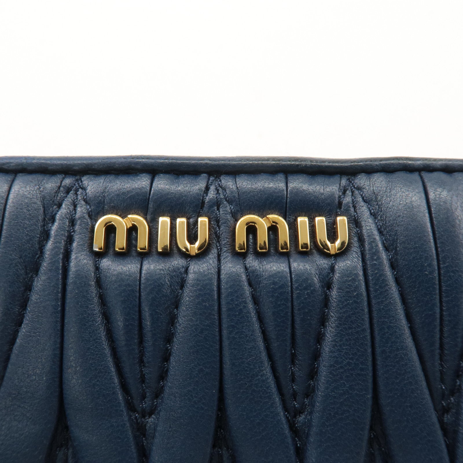 MIU MIU Matelasse Leather Bi-fold Wallet Navy 5ML522