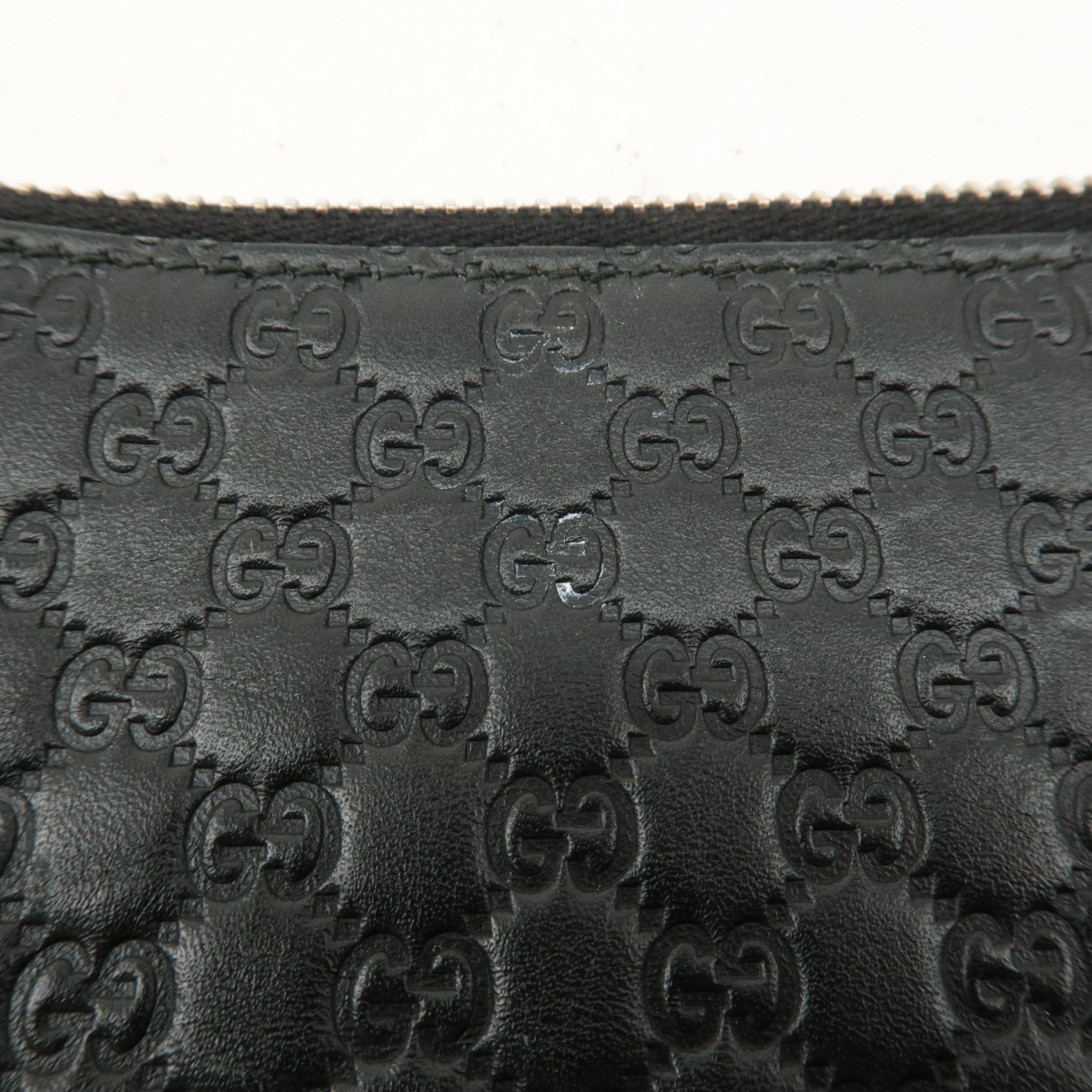 GUCCI Micro Guccissima Leather Clutch Bag Black 544477