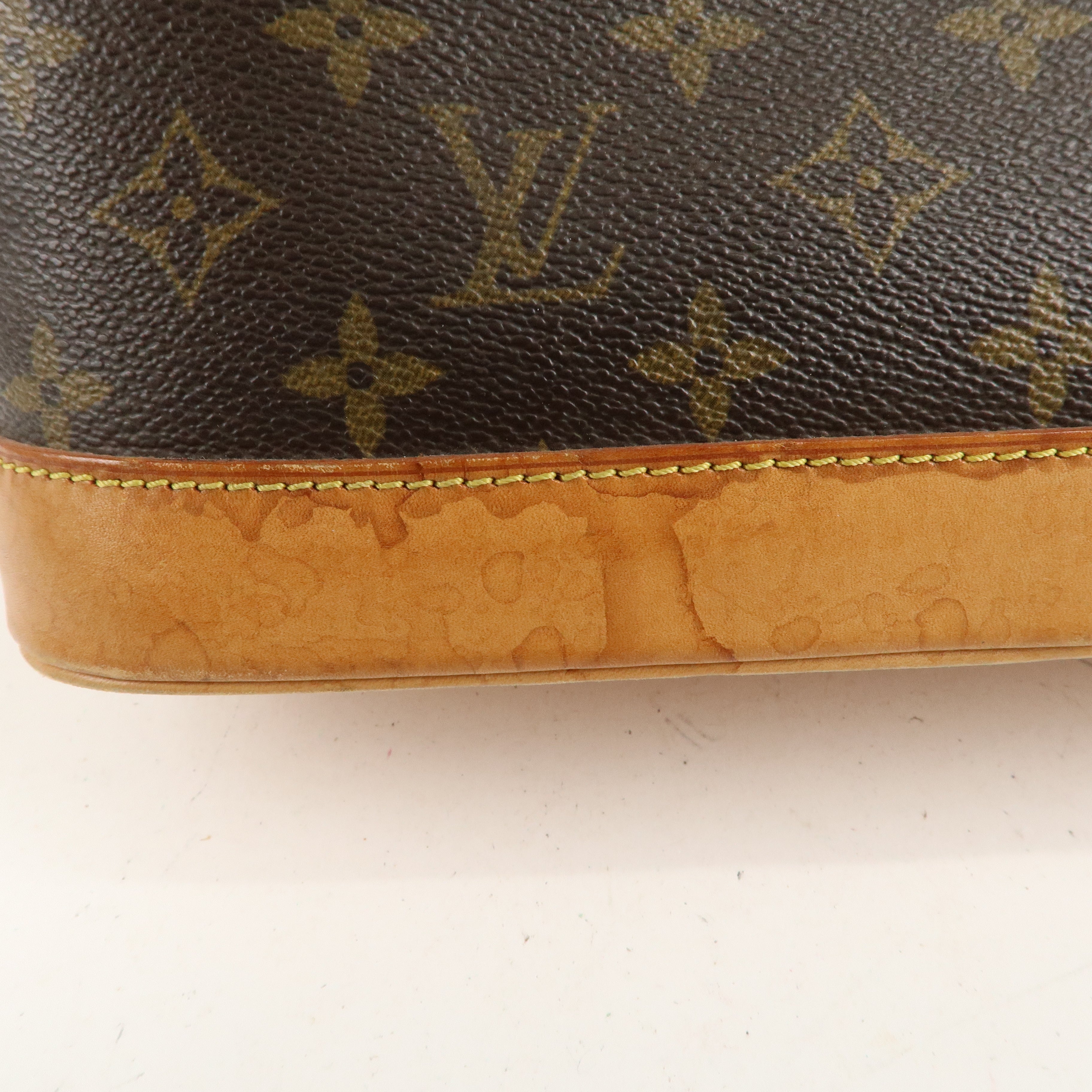 Louis Vuitton Monogram Alma Hand Bag Brown M51130