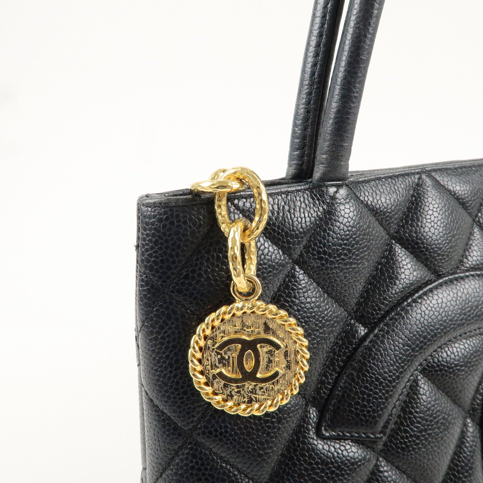 CHANEL Caviar Skin Matelasse Medallion Tote Bag Black A01804