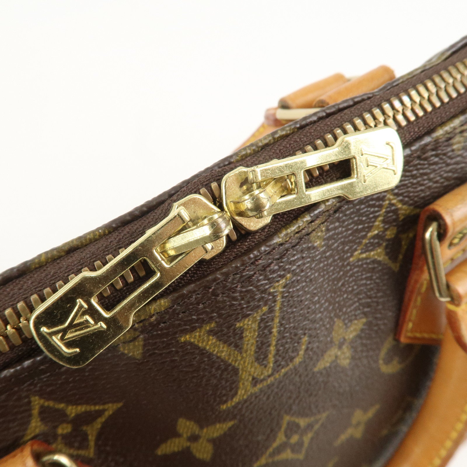 Louis Vuitton Monogram Alma Hand Bag Brown M51130