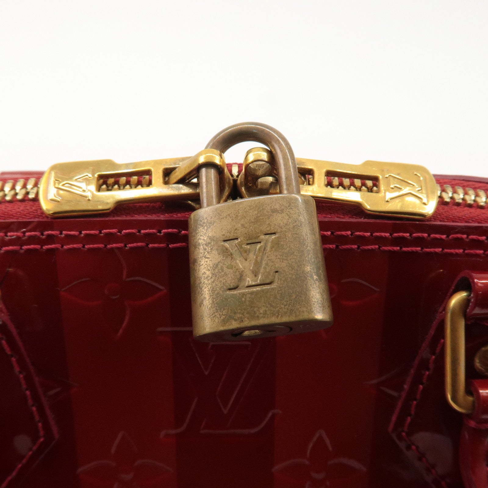 Louis Vuitton Monogram Vernis Rayures Alma BB Pomme d
Arour M91593