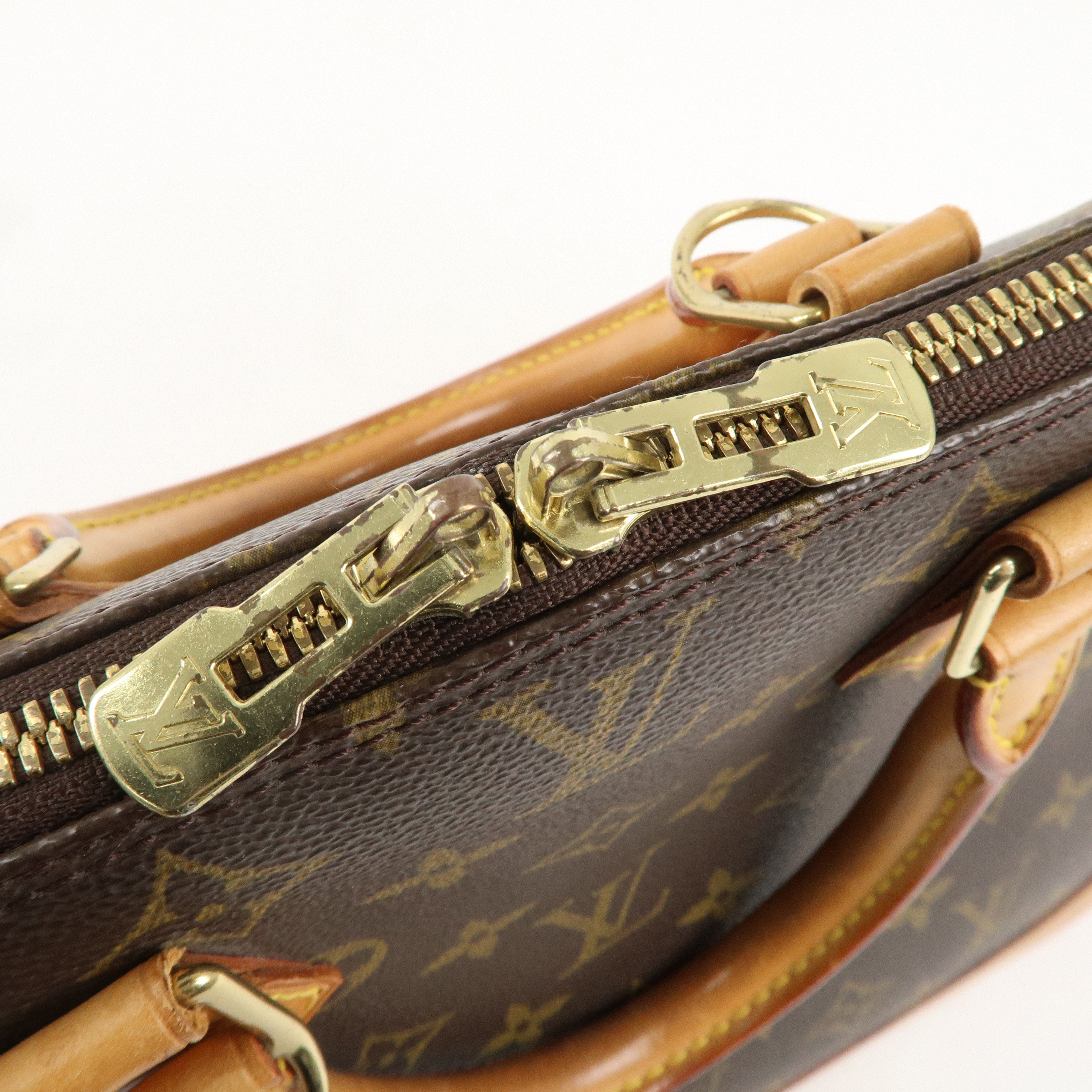 Louis Vuitton Monogram Alma Hand Bag Brown M51130