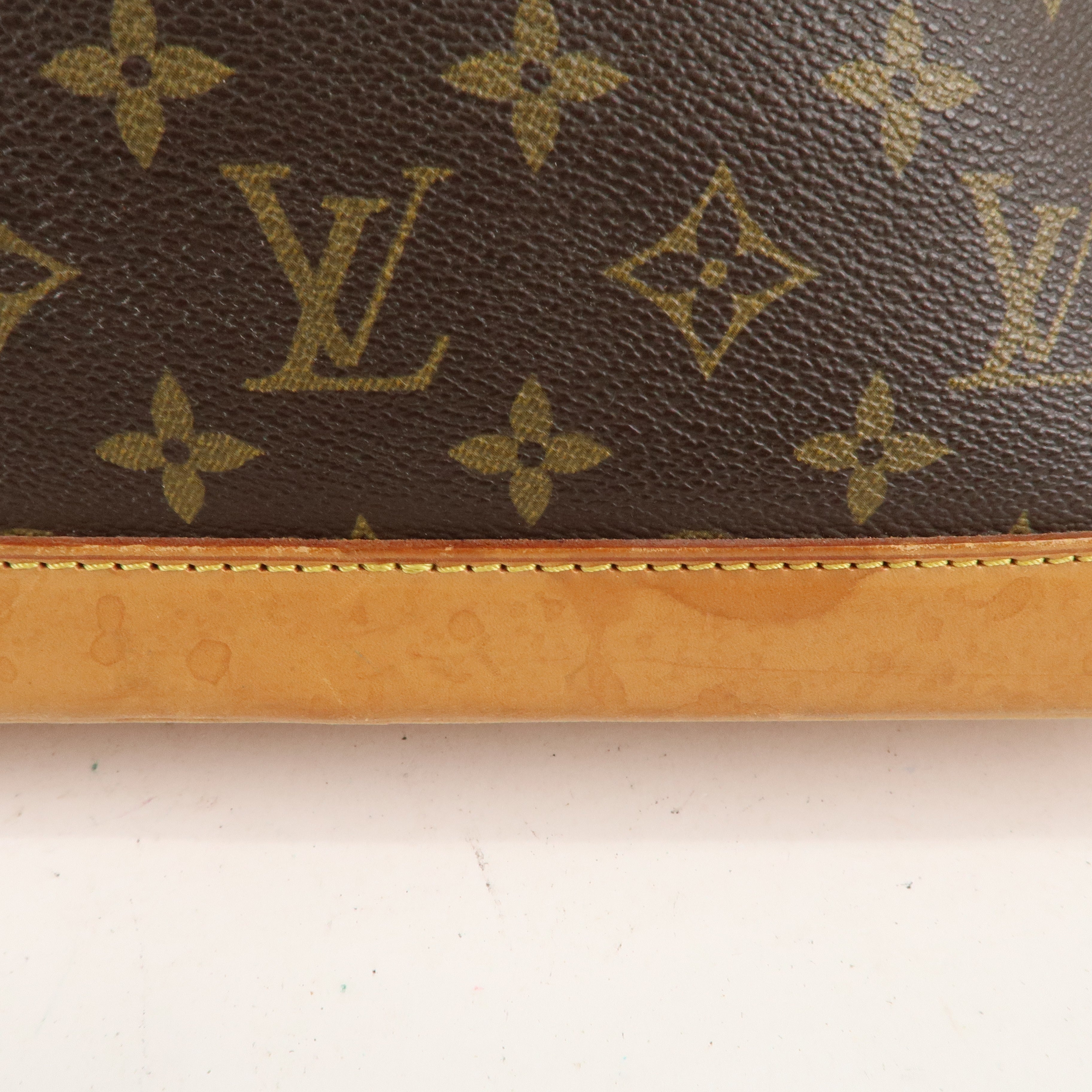 Louis Vuitton Monogram Alma Hand Bag Brown M51130