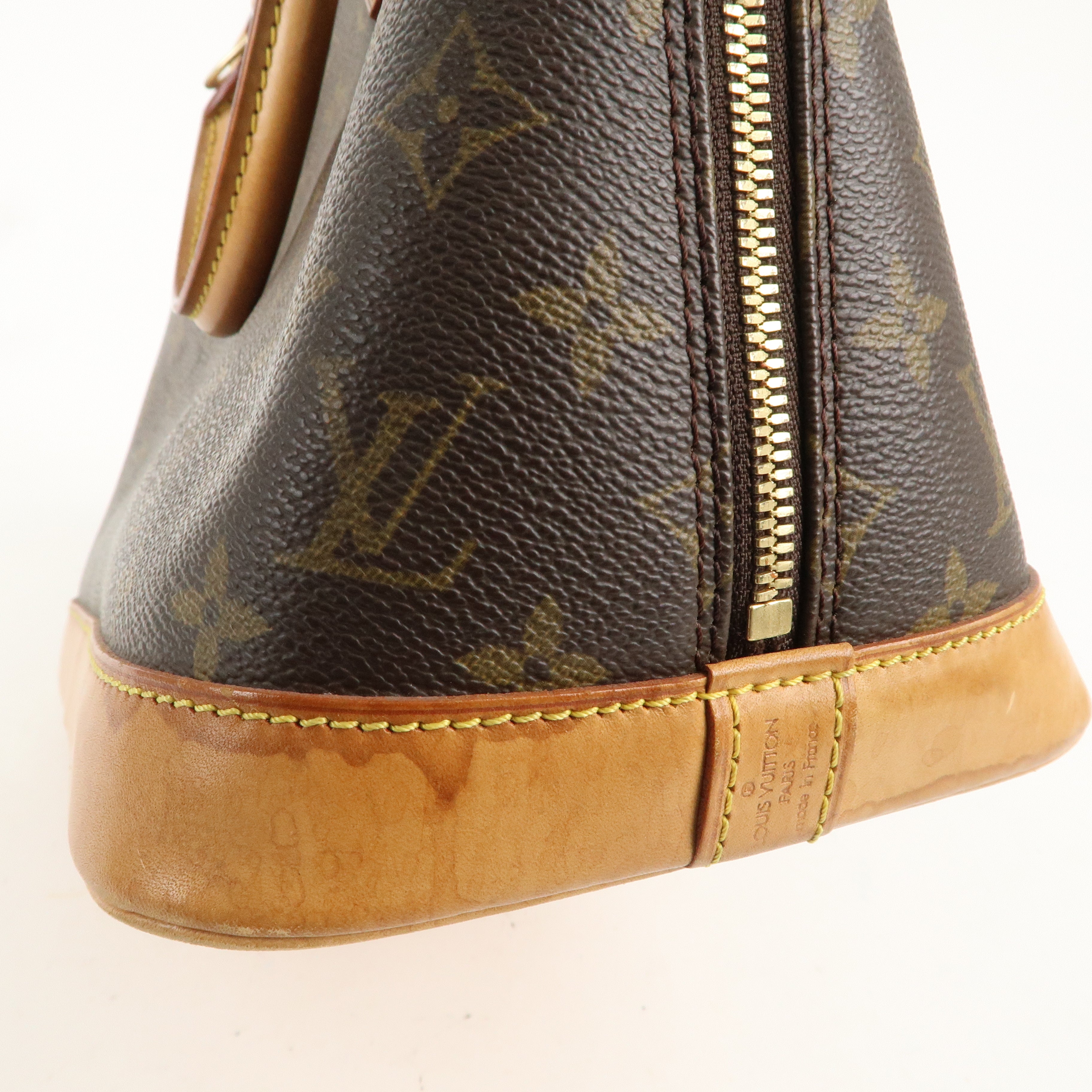 Louis Vuitton Monogram Alma Hand Bag Brown M51130