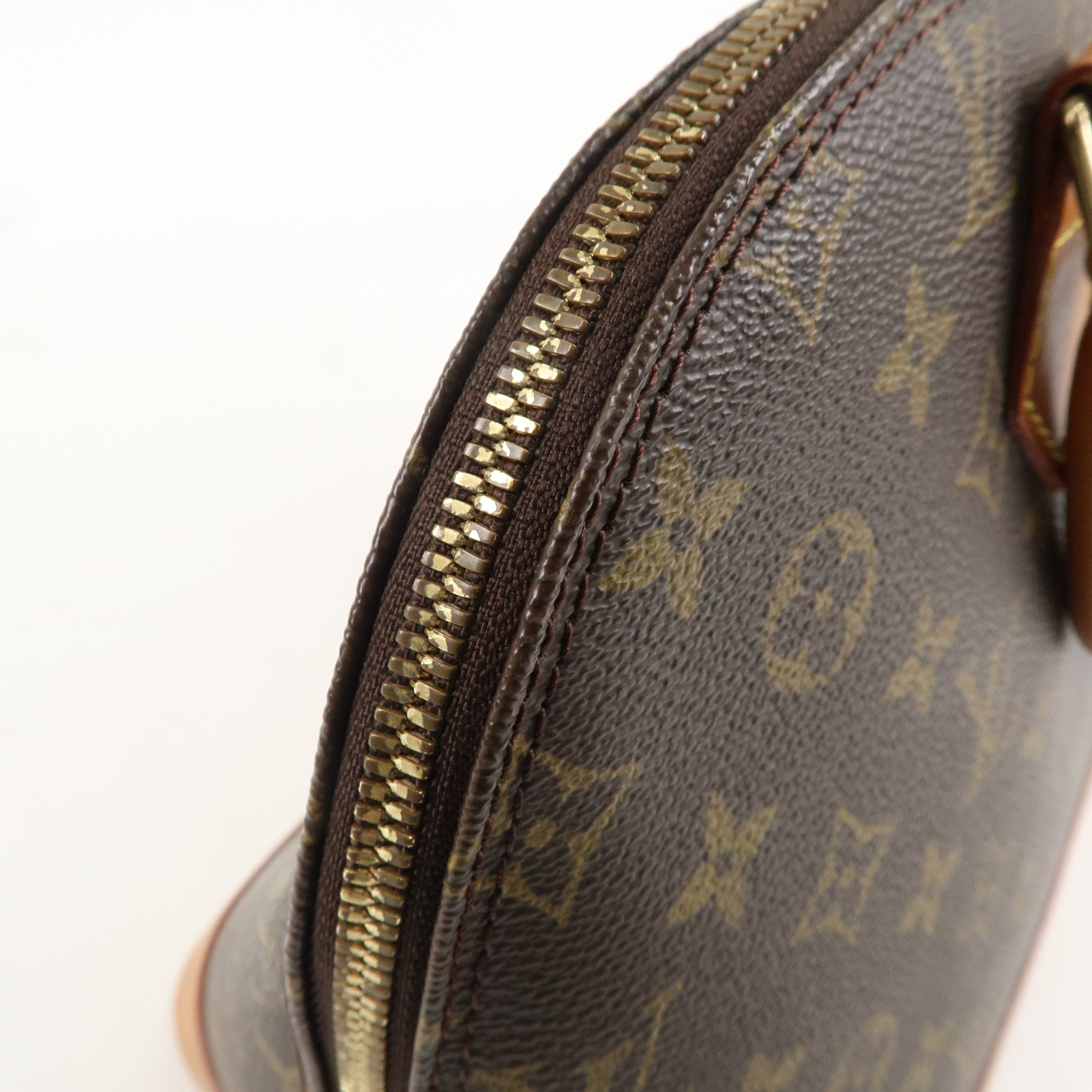 Louis Vuitton Monogram Alma Hand Bag Brown M51130