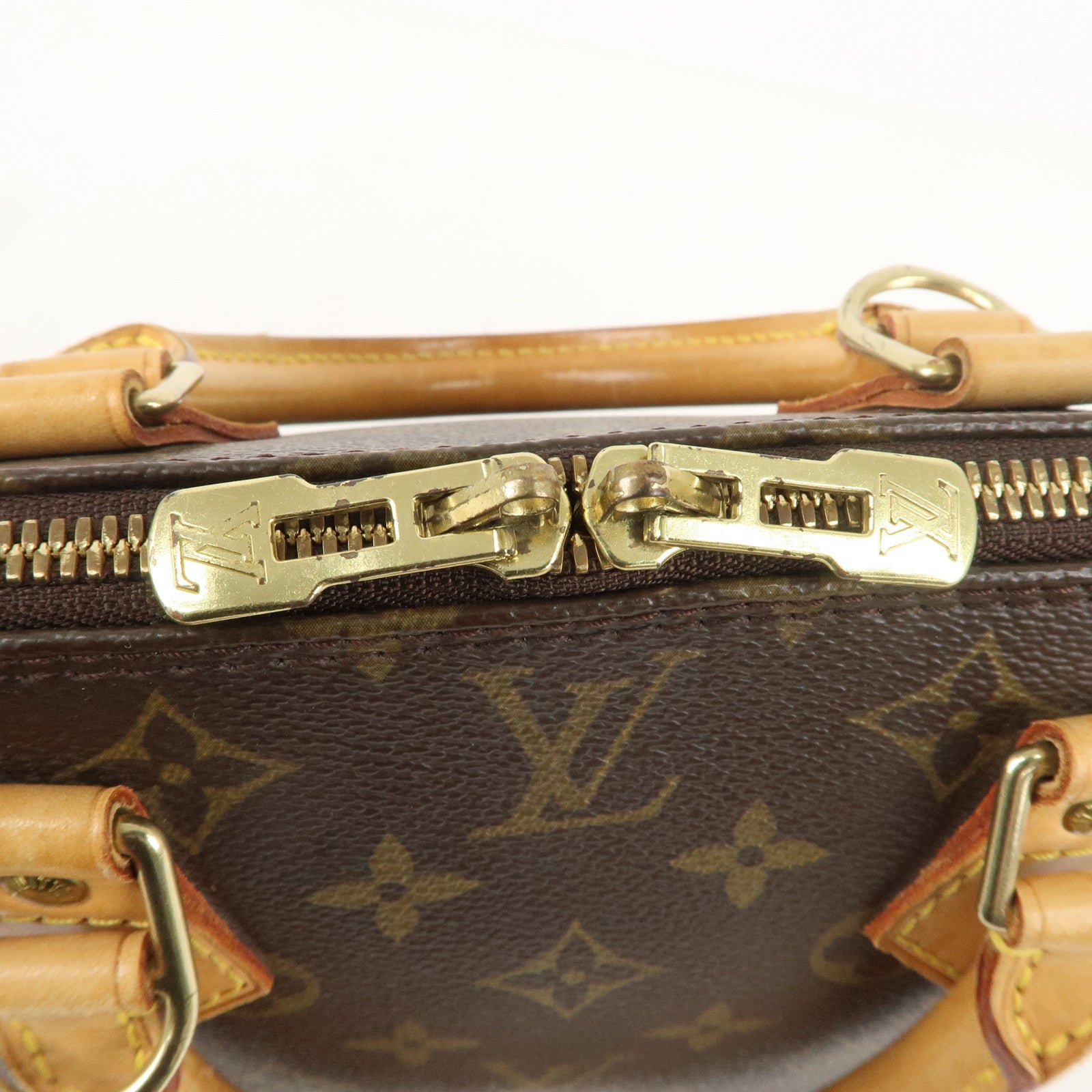 Louis Vuitton Monogram Alma Hand Bag Brown M51130