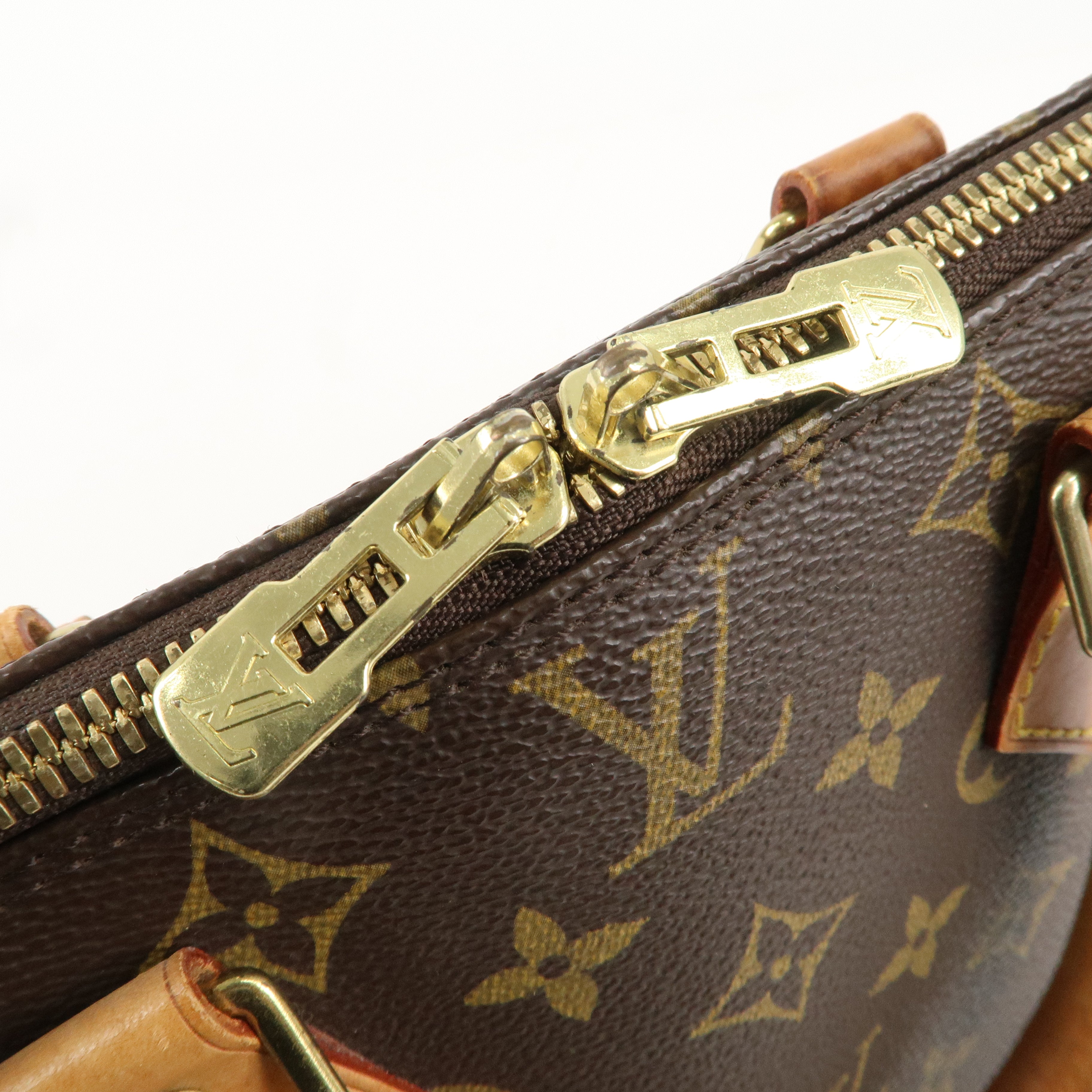 Louis Vuitton Monogram Alma Hand Bag Brown M51130