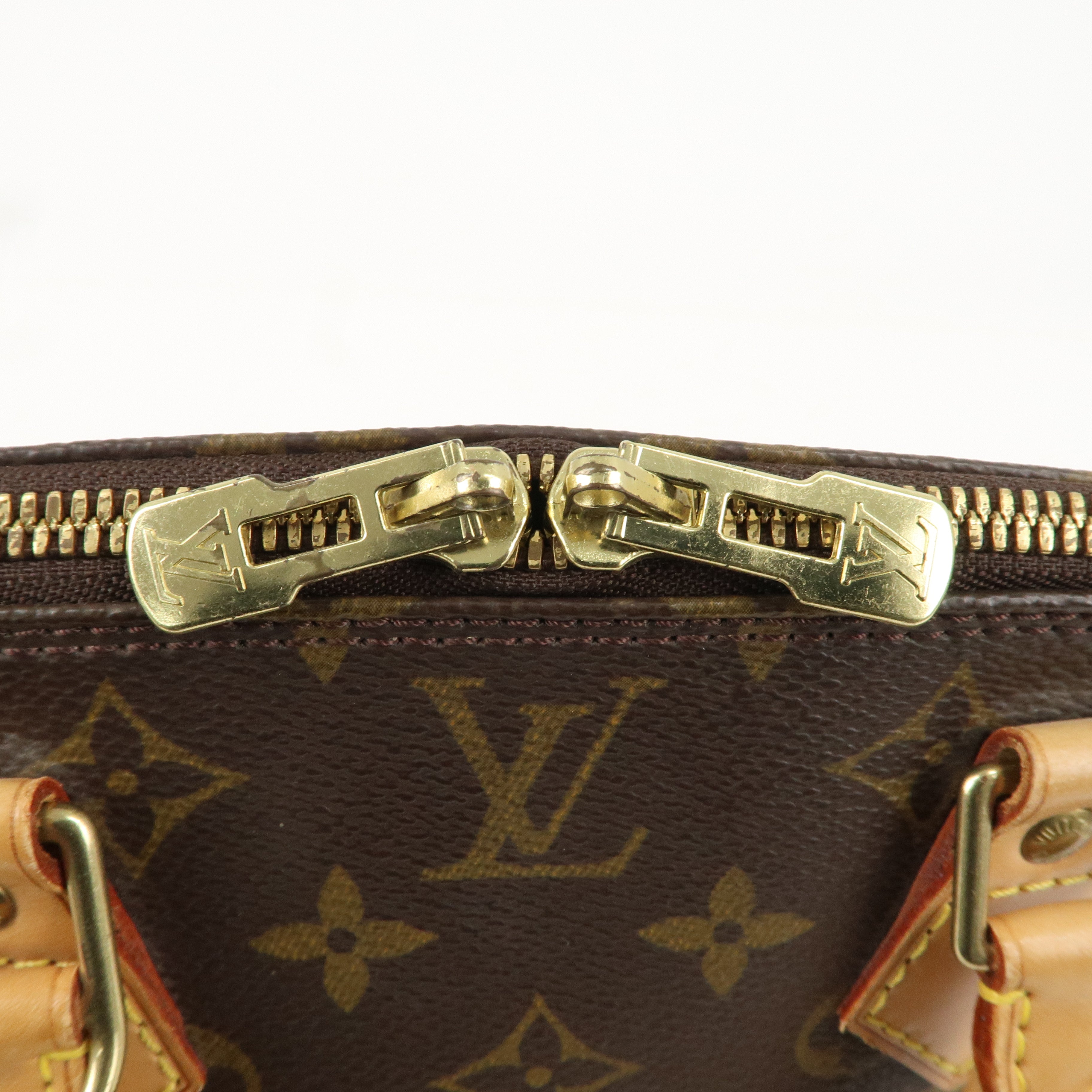 Louis Vuitton Monogram Alma Hand Bag Brown M51130