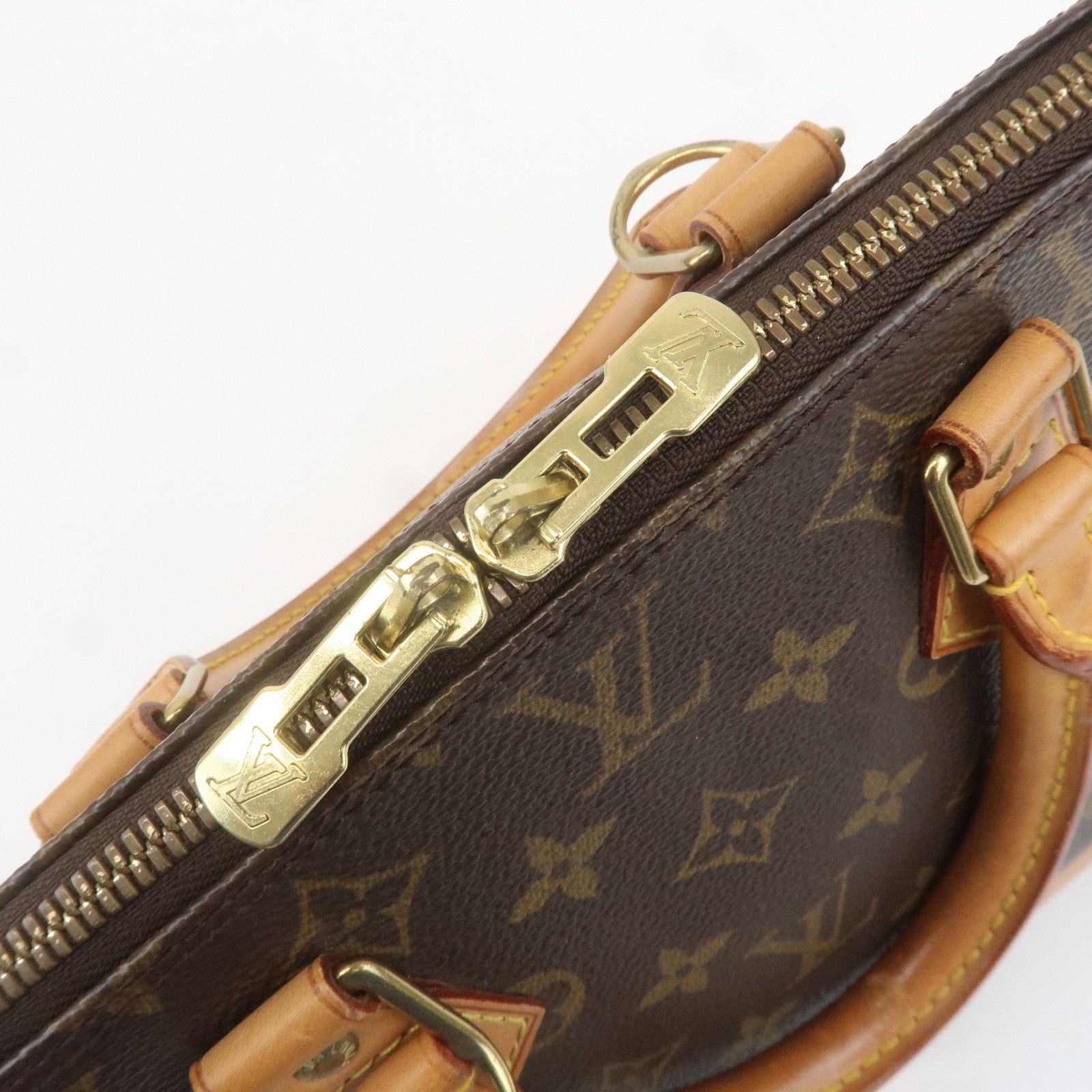 Louis Vuitton Monogram Alma Hand Bag Brown M51130