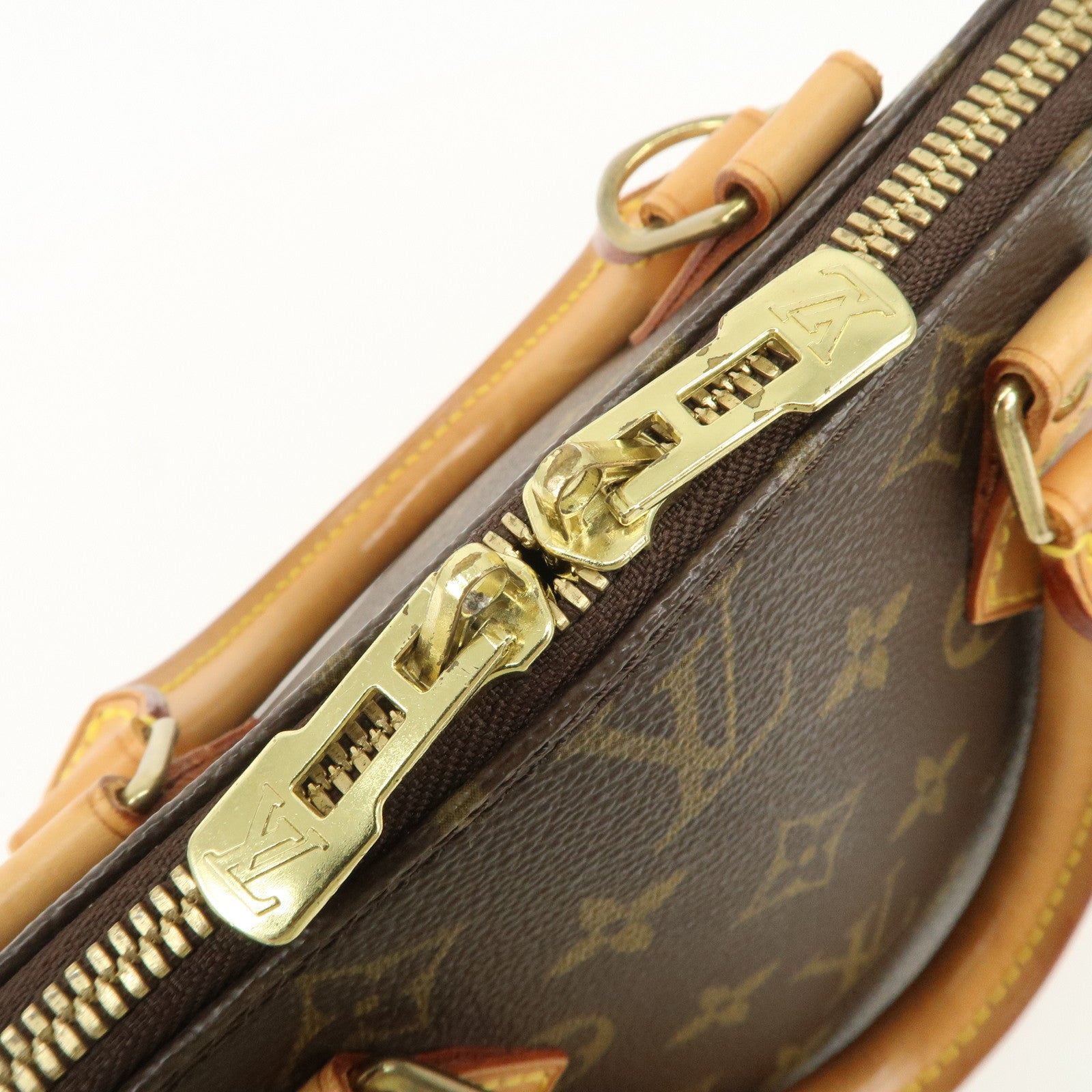 Louis Vuitton Monogram Alma Hand Bag Brown M51130