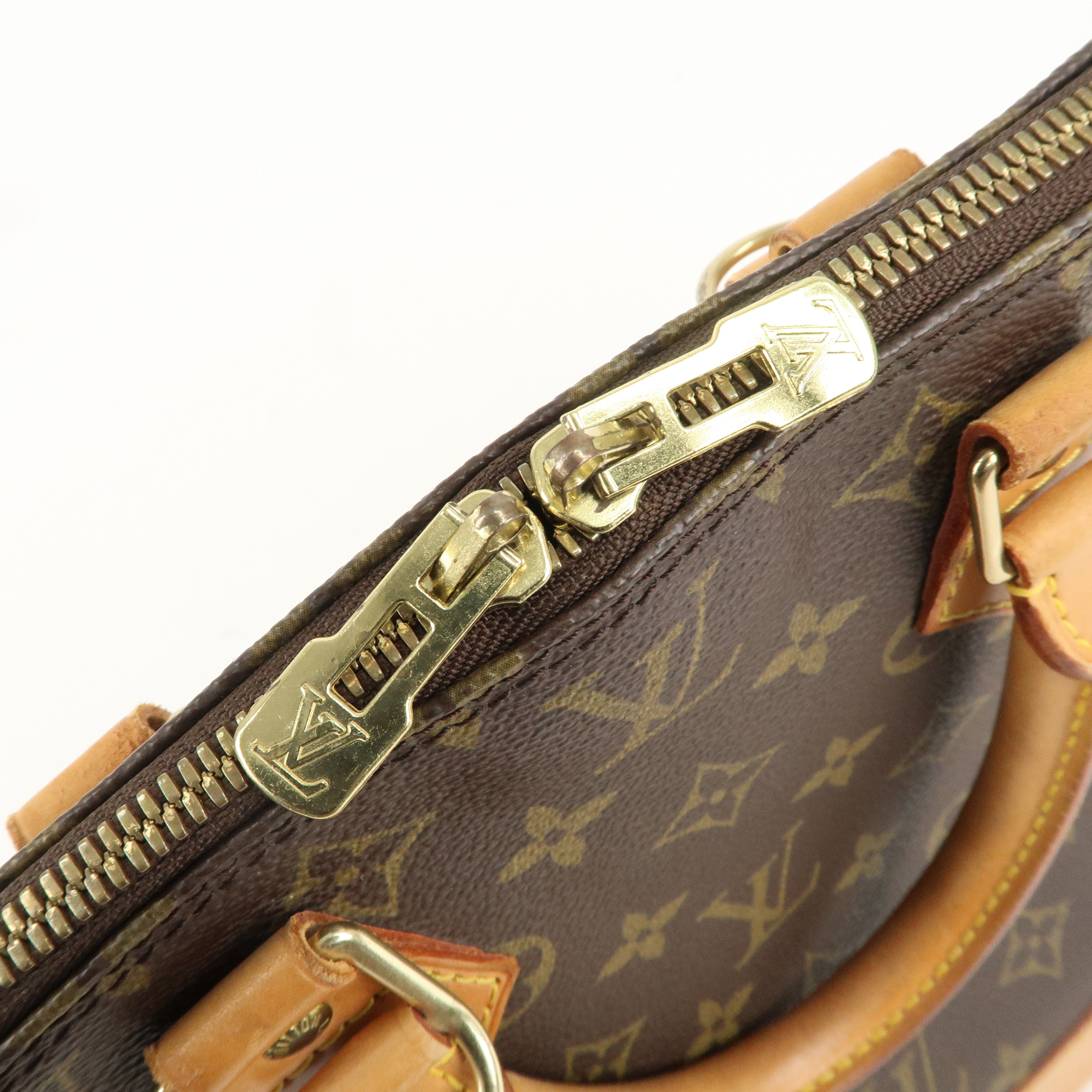 Louis Vuitton Monogram Alma Hand Bag Brown M51130