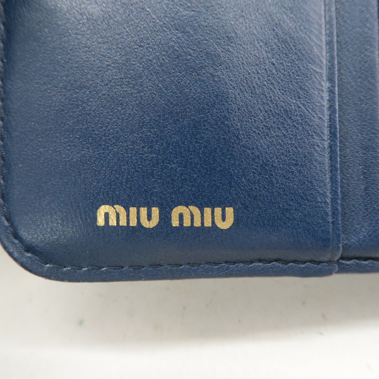 MIU MIU Matelasse Leather Bi-fold Wallet Navy 5ML522