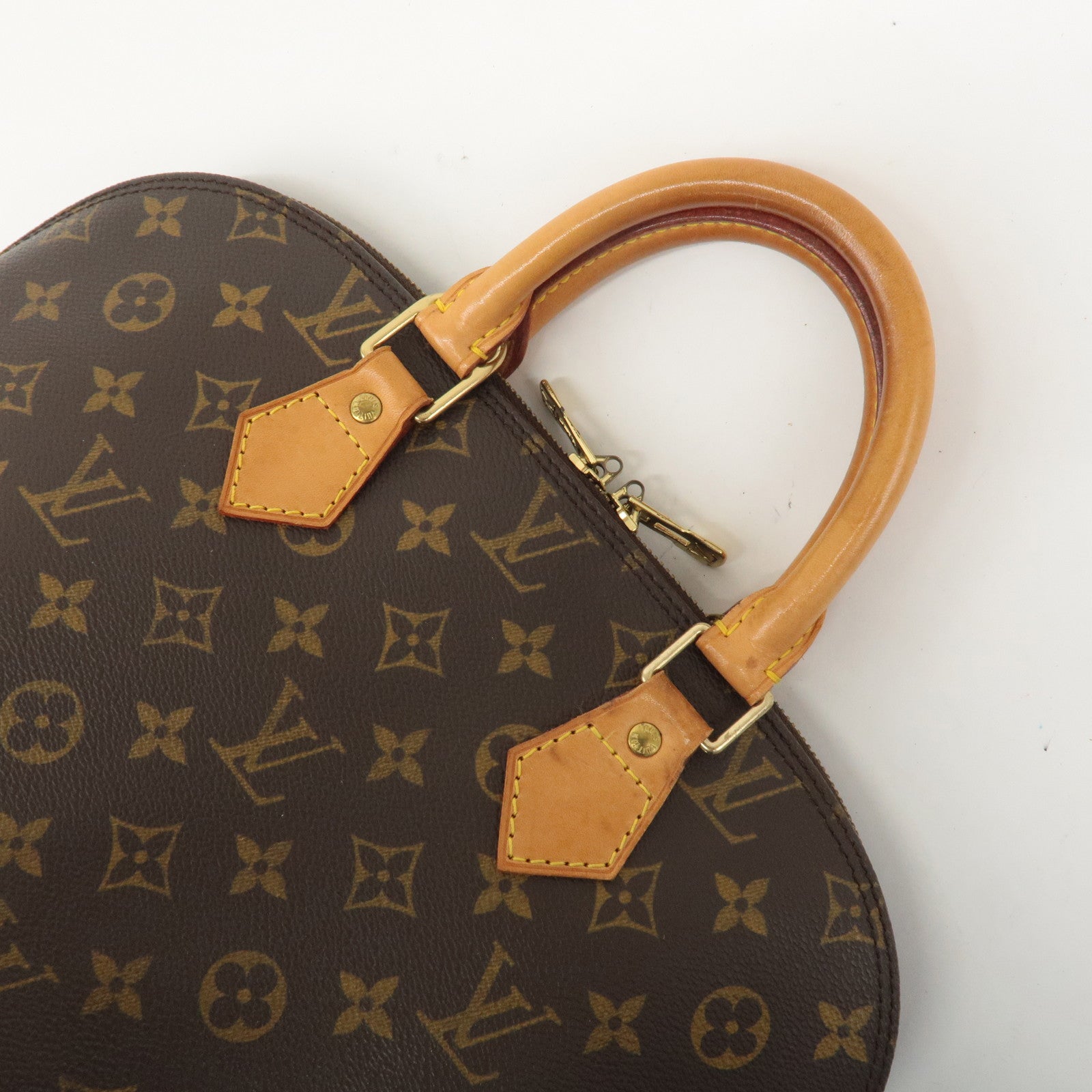 Louis Vuitton Monogram Alma Hand Bag Brown M51130