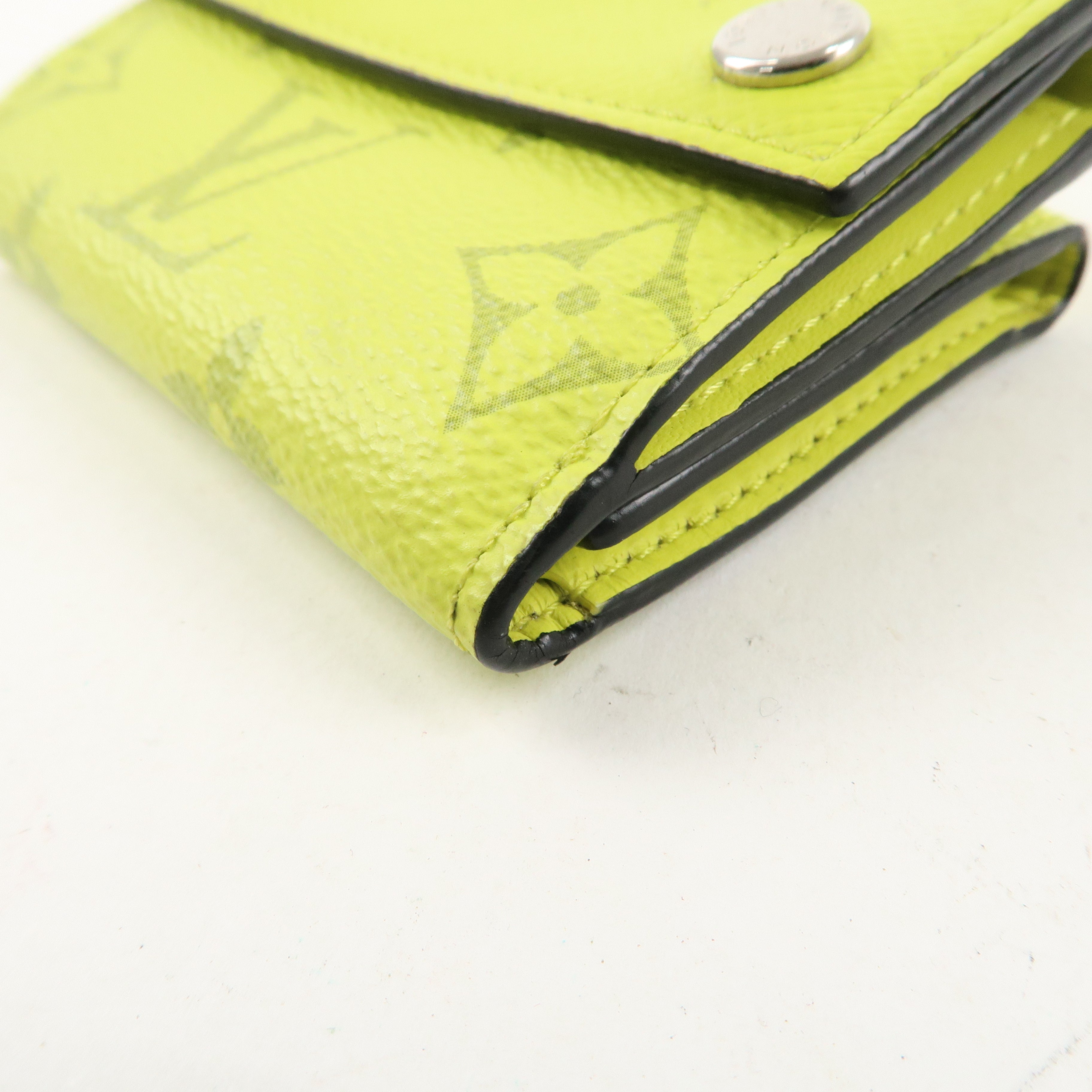 Louis Vuitton Taigalama Discovery Compact Wallet Jaune M67629