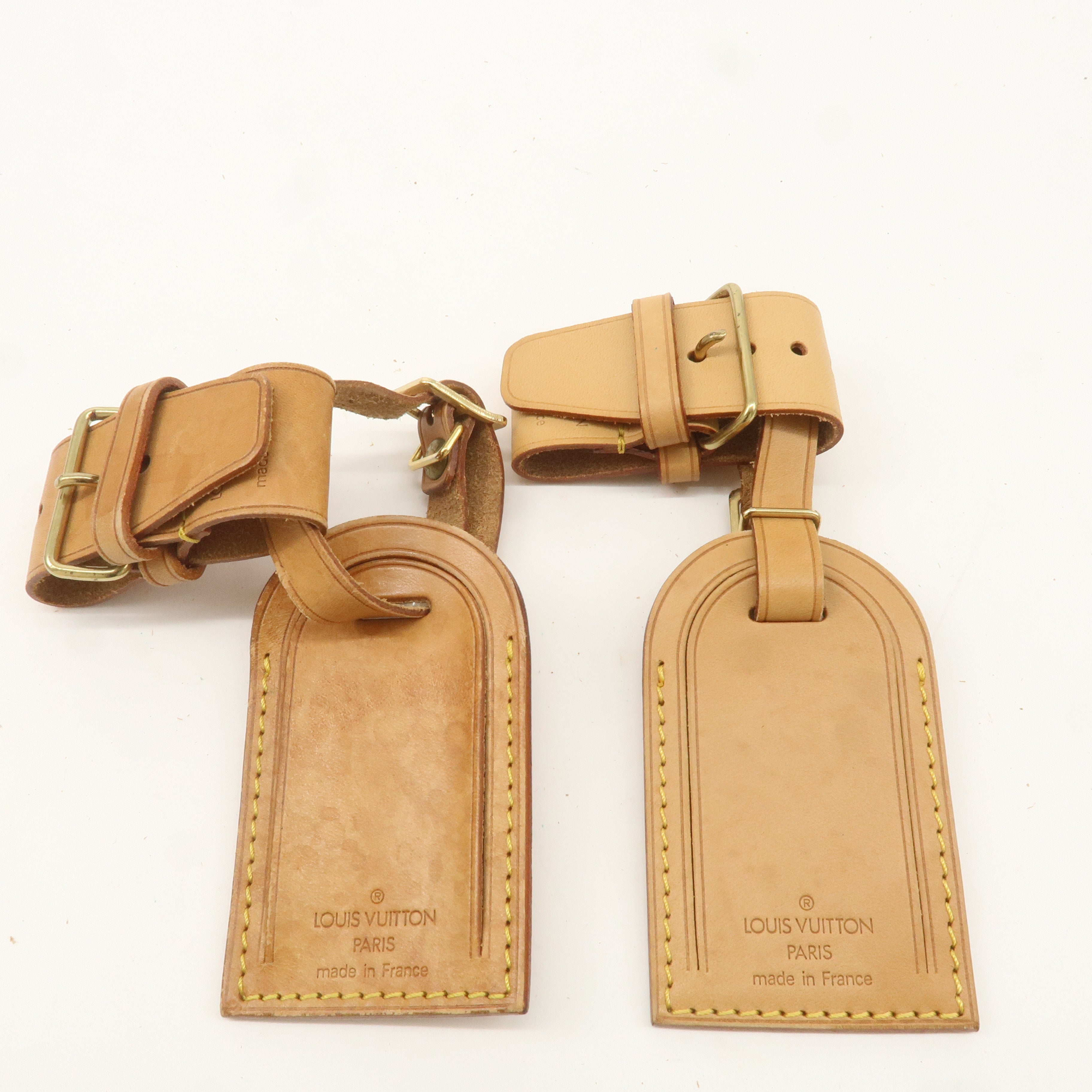 Louis Vuitton Set of 19 Name Tag 
Poignet Leather Beige