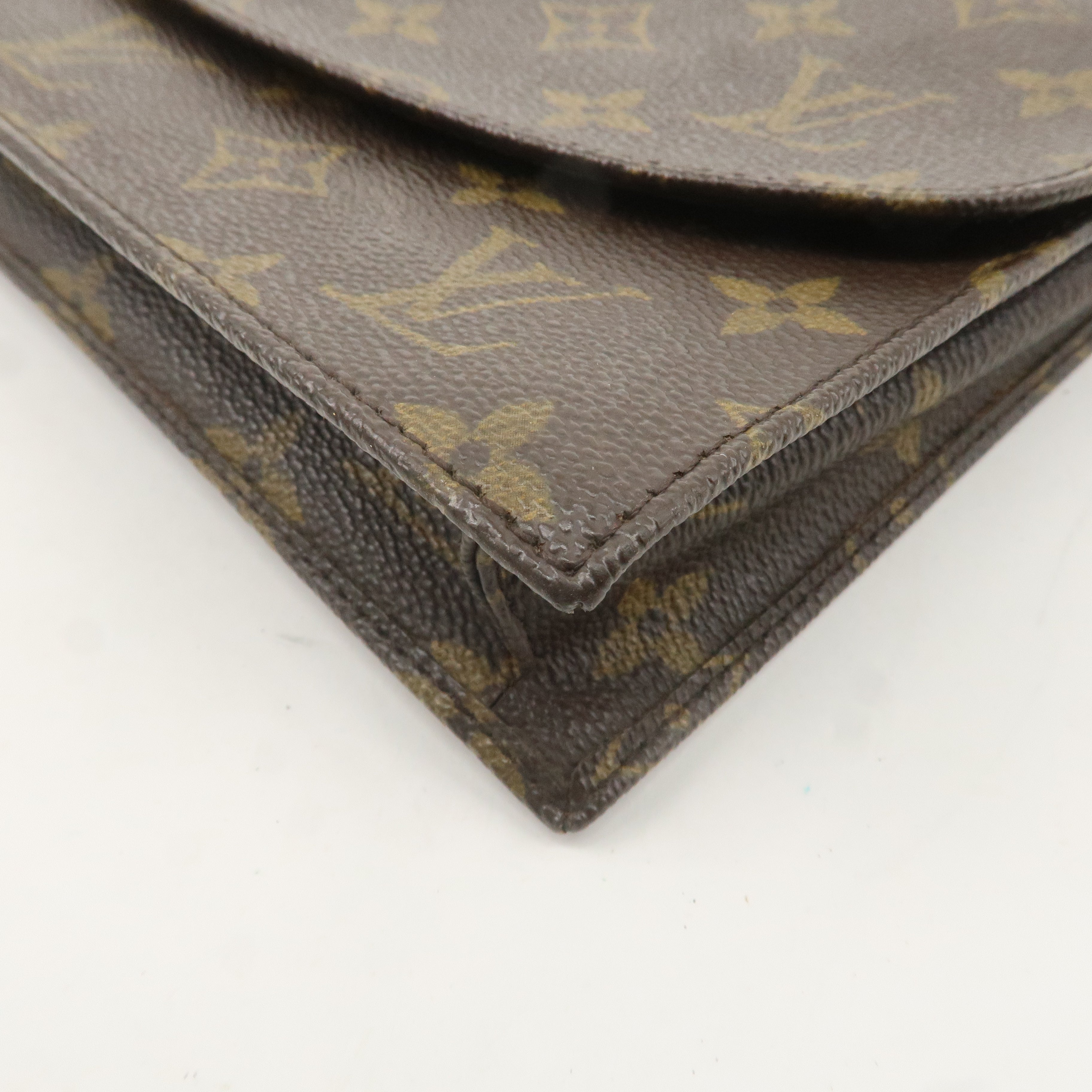 Louis Vuitton Monogram Pochette Lava 23 Clutch Bag M51940