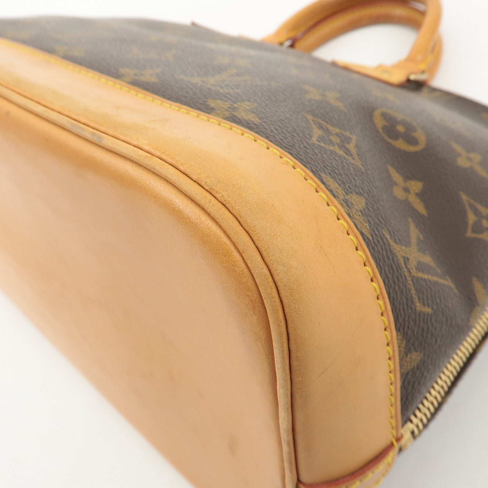 Louis Vuitton Monogram Alma Hand Bag Brown M51130