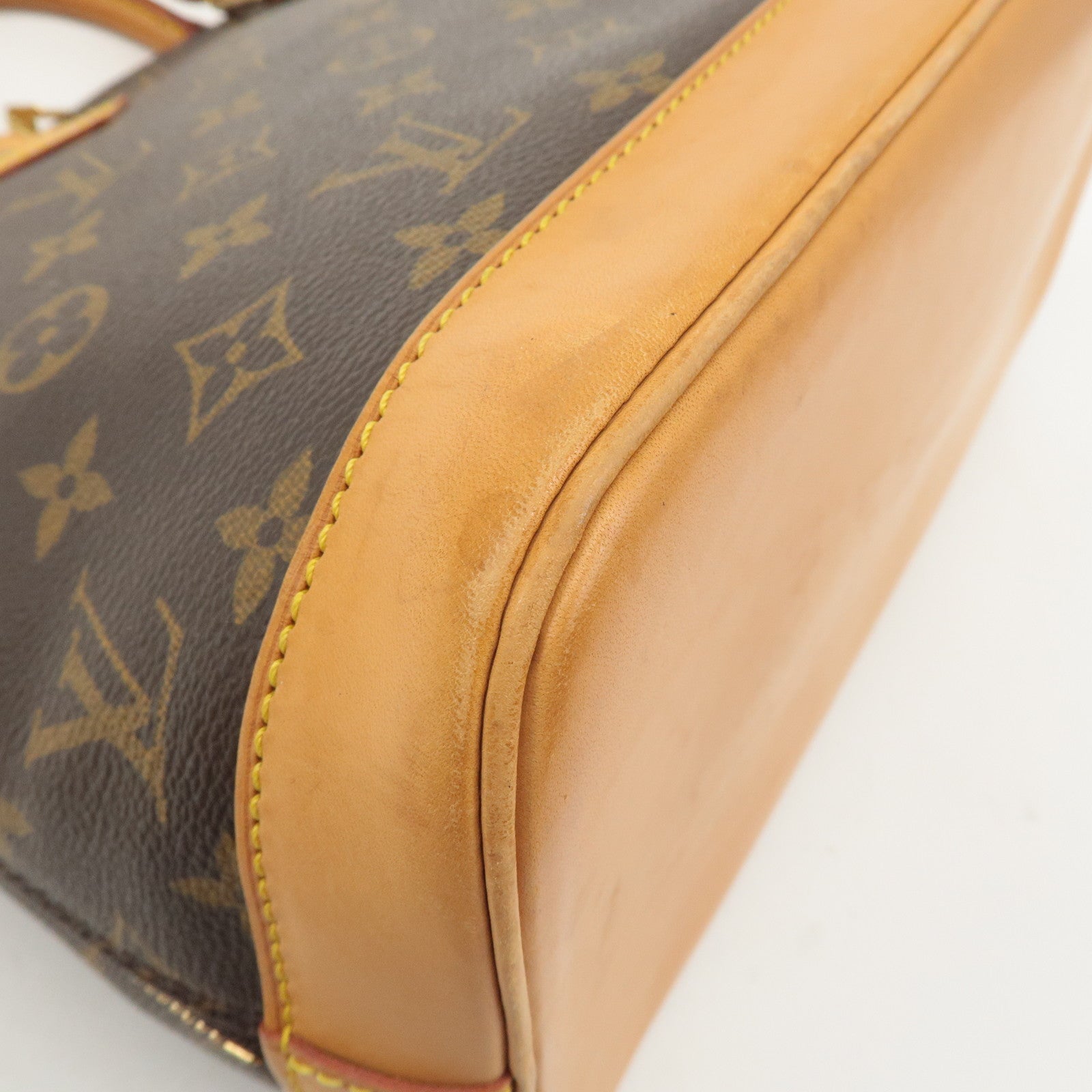 Louis Vuitton Monogram Alma Hand Bag Brown M51130