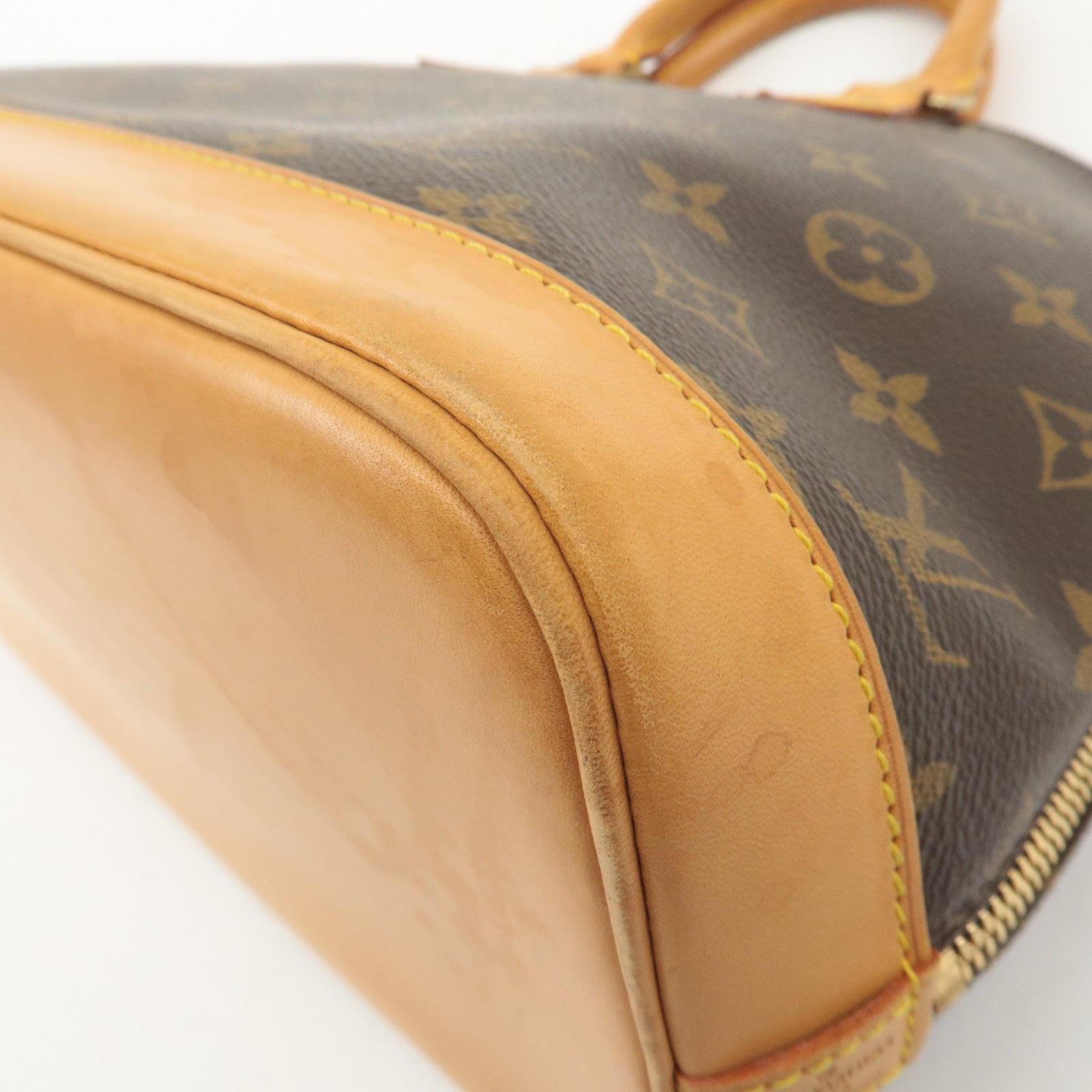 Louis Vuitton Monogram Alma Hand Bag Brown M51130