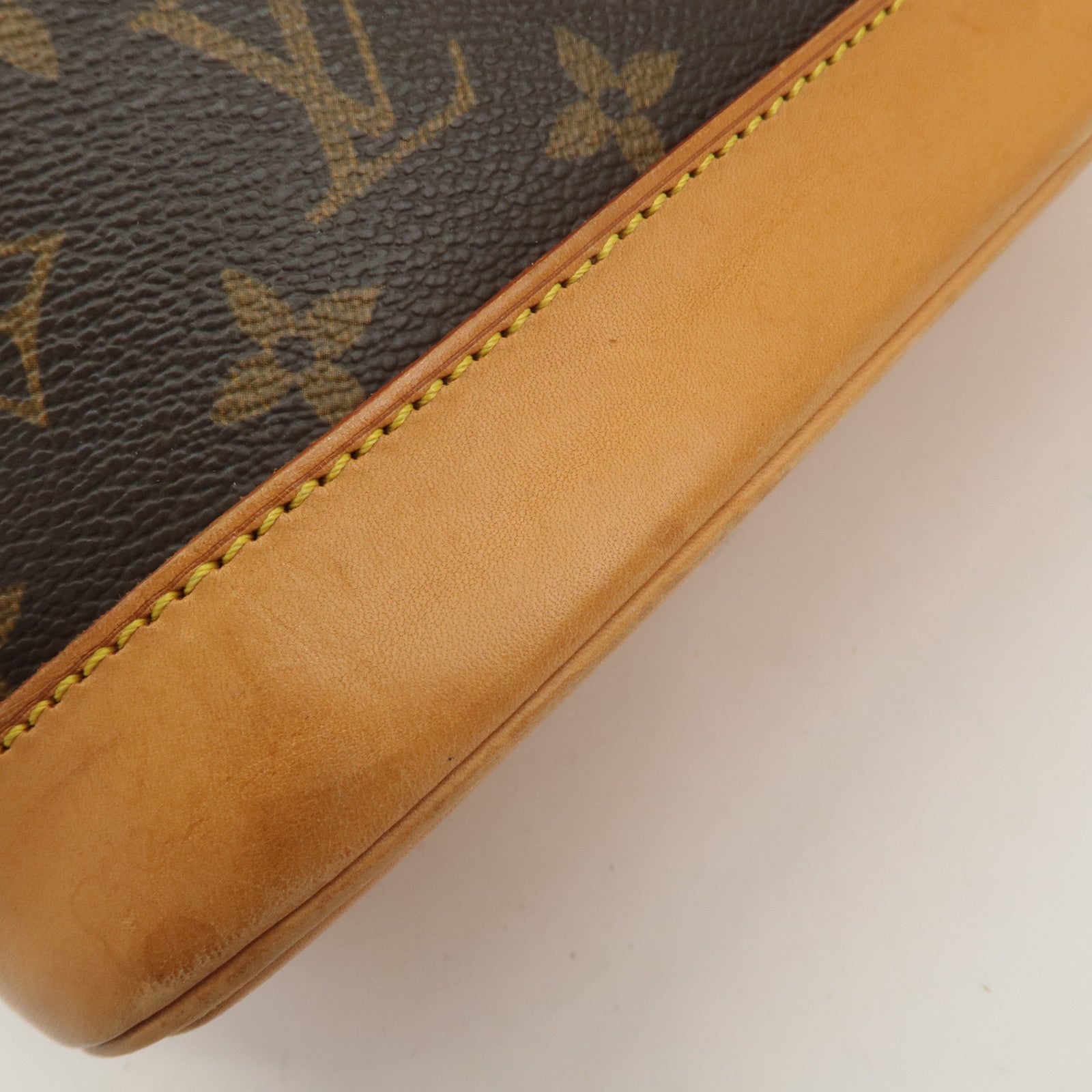 Louis Vuitton Monogram Alma Hand Bag Brown M51130