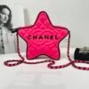 Chanel 24C Fuchsia Satin Walk of Fame Star Bag with Black Lacquered Hardware.