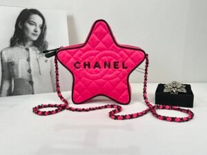 Chanel 24C Fuchsia Satin Walk of Fame Star Bag with Black Lacquered Hardware.
