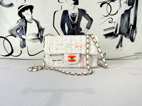 Chanel 24C White Tweed Mini Flap with Orange Enamel CC and Champagne Gold Hardware.