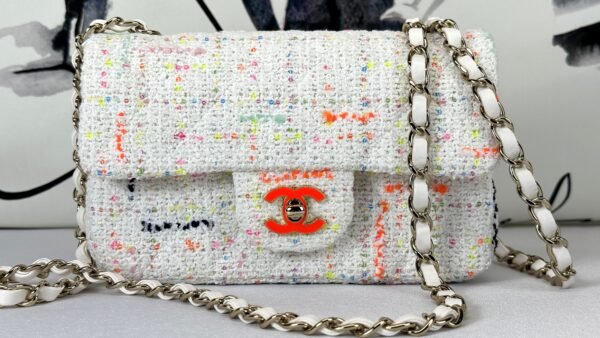 Chanel 24C White Tweed Mini Flap with Orange Enamel CC and Champagne Gold Hardware.