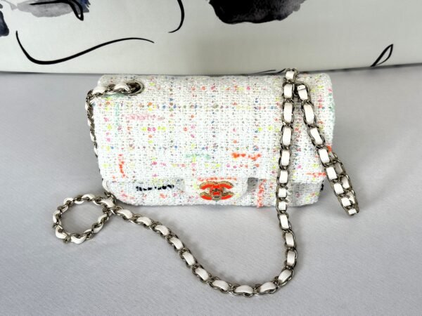 Chanel 24C White Tweed Mini Flap with Orange Enamel CC and Champagne Gold Hardware.