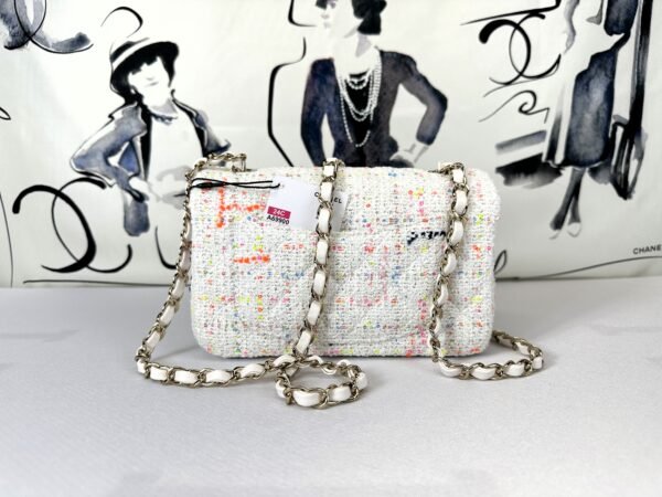 Chanel 24C White Tweed Mini Flap with Orange Enamel CC and Champagne Gold Hardware.
