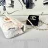 Chanel 24C White Tweed Mini Flap with Orange Enamel CC and Champagne Gold Hardware.