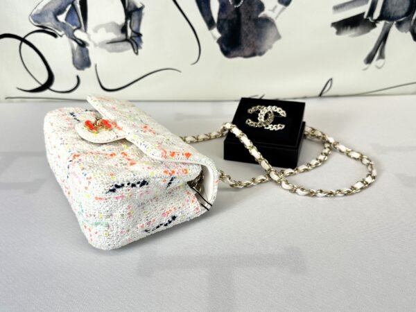 Chanel 24C White Tweed Mini Flap with Orange Enamel CC and Champagne Gold Hardware.