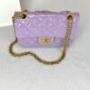 Chanel 24P Light Purple Aged Calfskin Mini Reissue with Matte Gold Hardware.