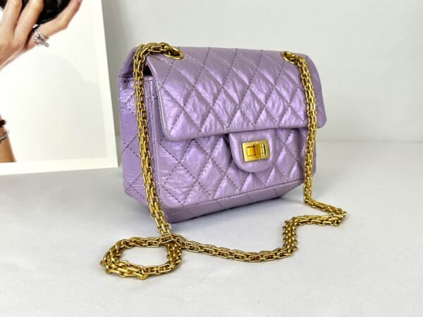 Chanel 24P Light Purple Aged Calfskin Mini Reissue with Matte Gold Hardware.