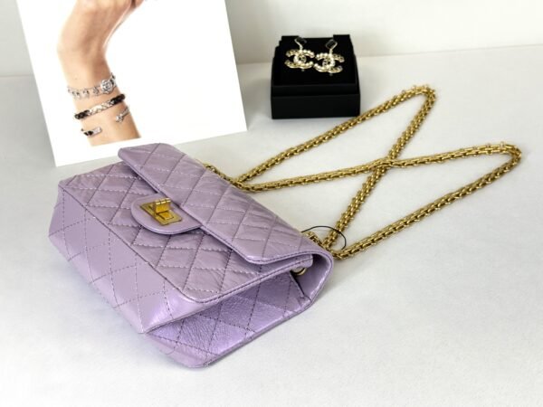 Chanel 24P Light Purple Aged Calfskin Mini Reissue with Matte Gold Hardware.