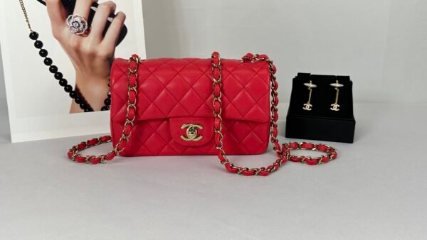 Chanel 24S Dark Red Lambskin  Rectangular Mini with Champagne Gold Hardware.