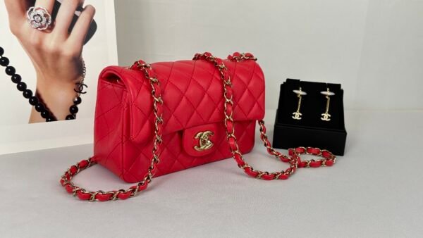 Chanel 24S Dark Red Lambskin  Rectangular Mini with Champagne Gold Hardware.
