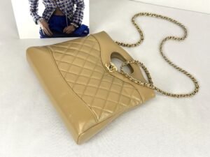 IMG_6918 Chanel 24S Beige Shiny Crumpled Lambskin Mini 31 Bag with Champagne Gold Hardware.