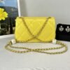 Chanel 24S Yellow Iridescent Lambskin Pearl Twin Flap Bag.