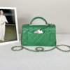 Chanel 24A Green Lambskin Top Handle Mini with Champagne Gold Hardware.