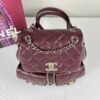 Chanel 24A Burgundy Caviar Medium Duma Backpack.